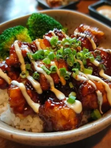 Delicious Sticky Chicken Rice Bowls with glazed chicken and vegetables